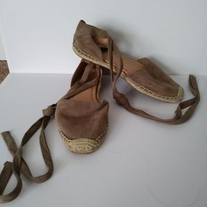 Women's size 7.5 by the way. tan lace up flats